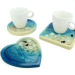 Set van 4 ronde houten onderzetters, diameter 11 cm.