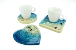 Set van 4 ronde houten onderzetters, diameter 11 cm.